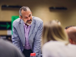 Photo of smiling Josh Clark in a workshop group