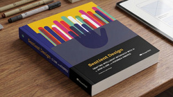 Sentient Design book on a desk
